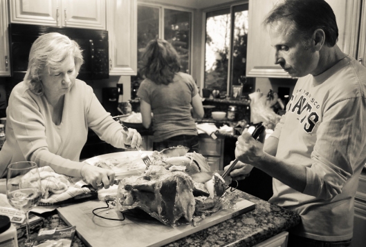 My uncle and his sister carving the rather enormous turkey.